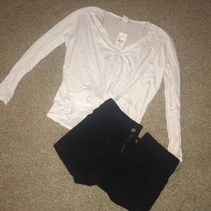 White surplice shirt & black shorts